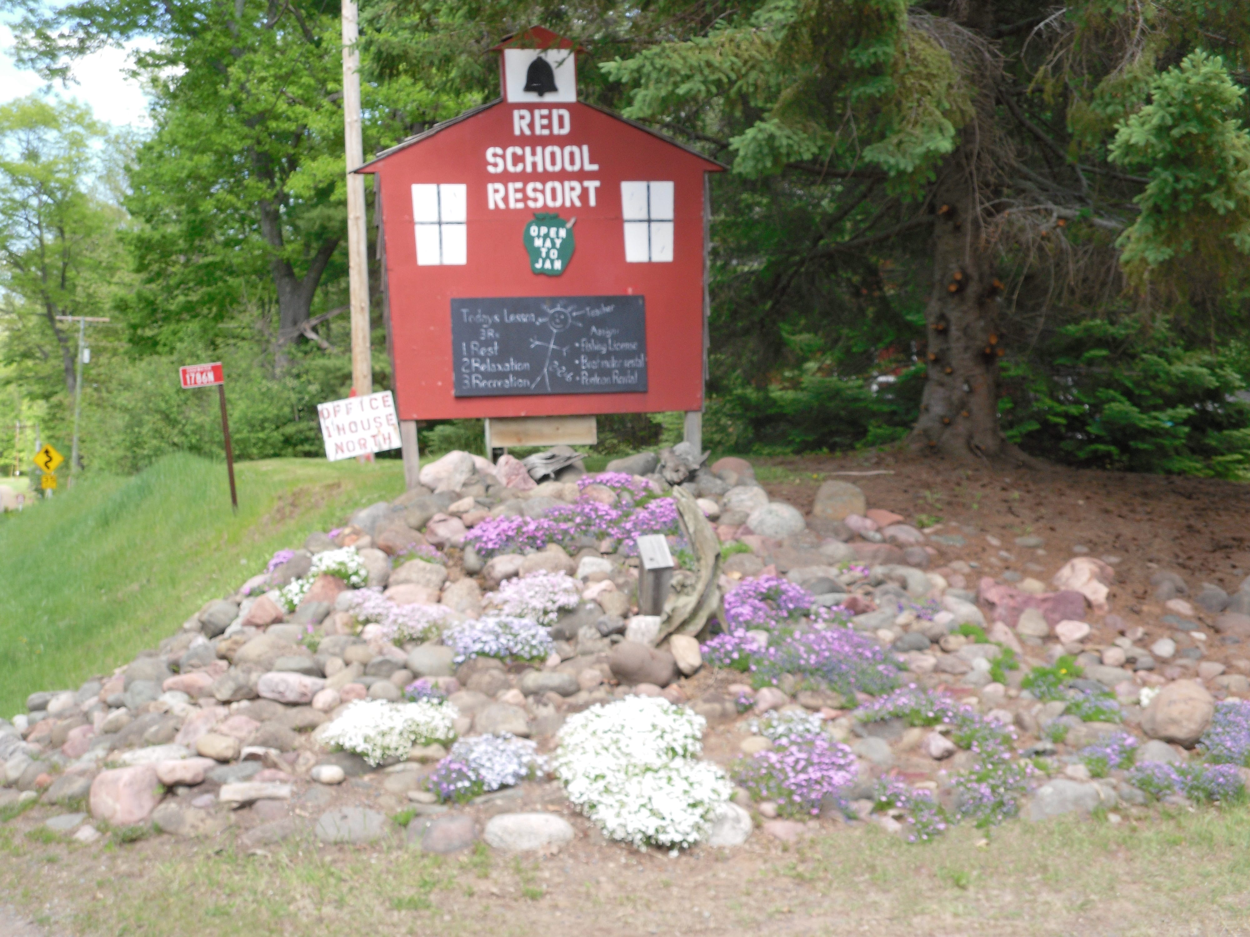 Red School Resort School sign.