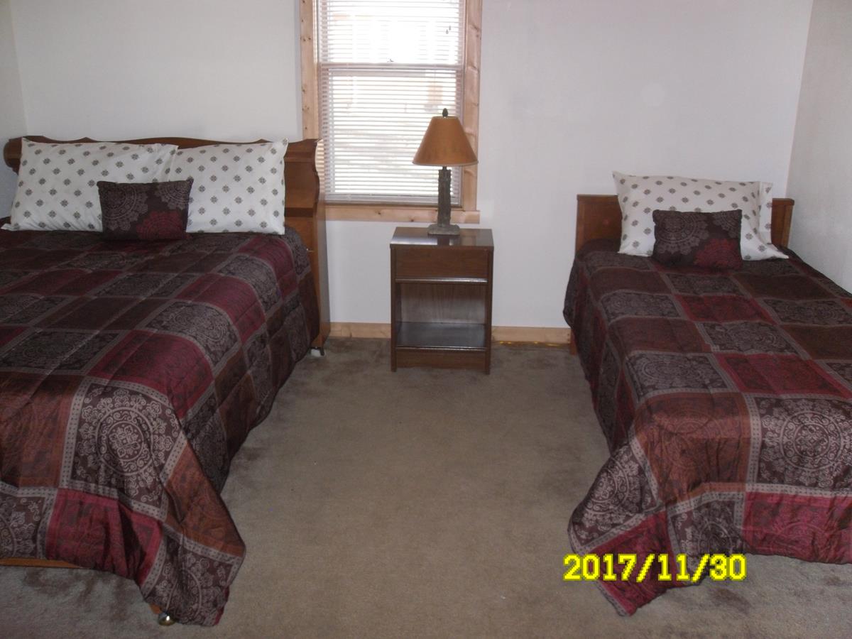 View of one of cabin 3 bedrooms