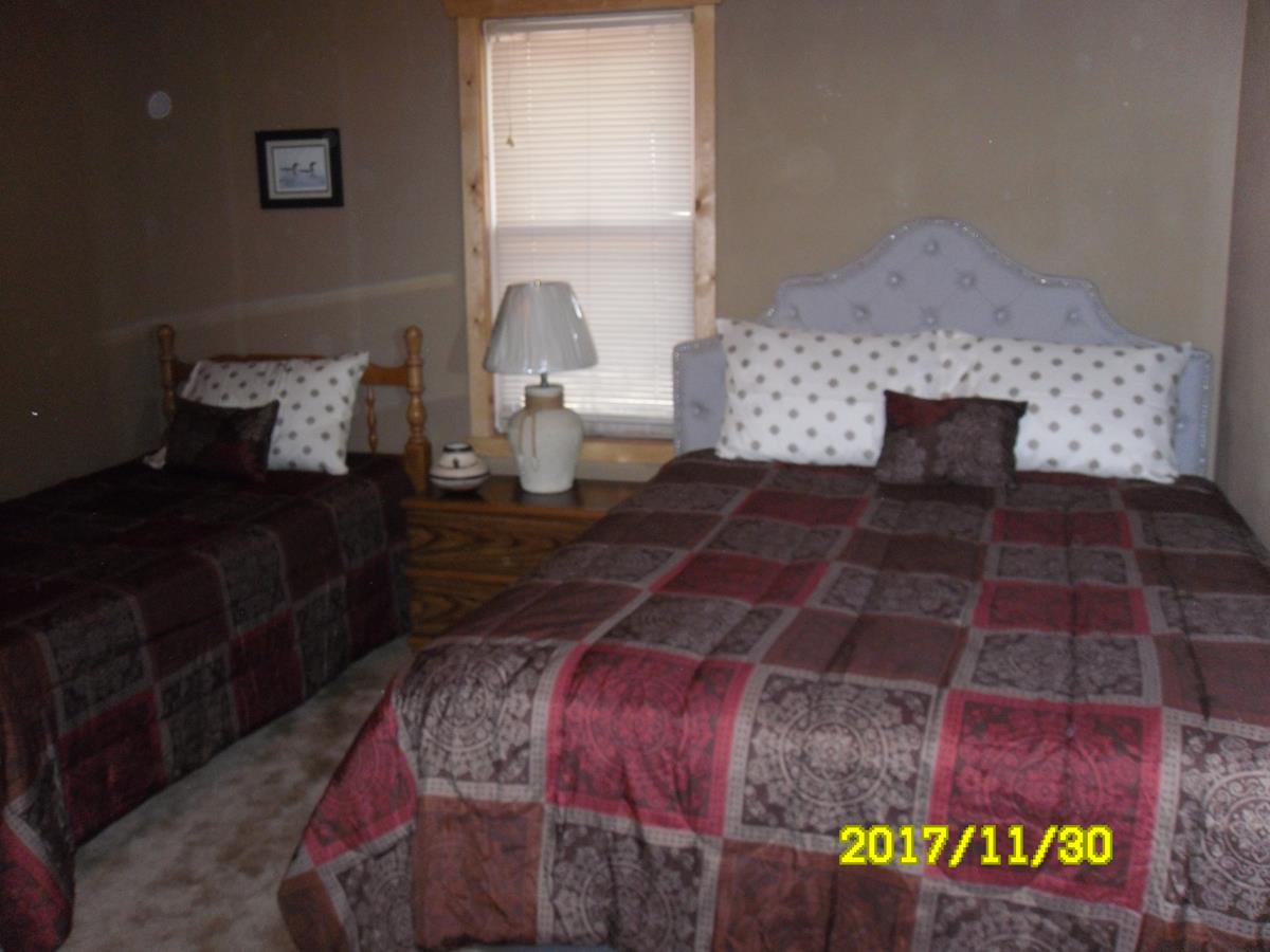 View of one of cabin 3 bedrooms