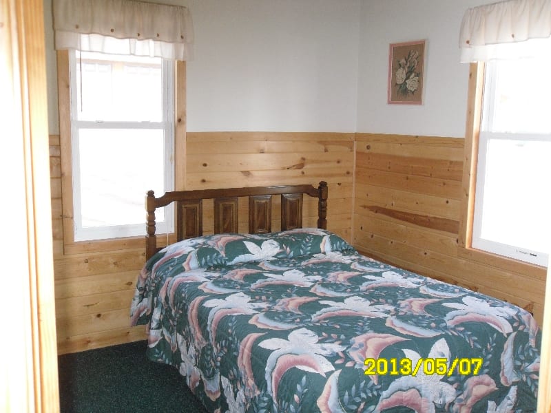 View of one of the cabin 1 bedrooms