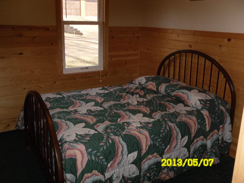 View of one of the cabin 1 bedrooms